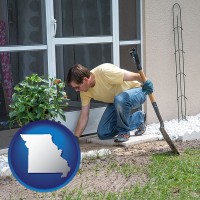 a landscape contractor working on a landscaping project - with MO icon