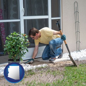 a landscape contractor working on a landscaping project - with Arizona icon